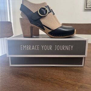 Dansko Two-Tone Black and Tan Wedge Clog with Buckle